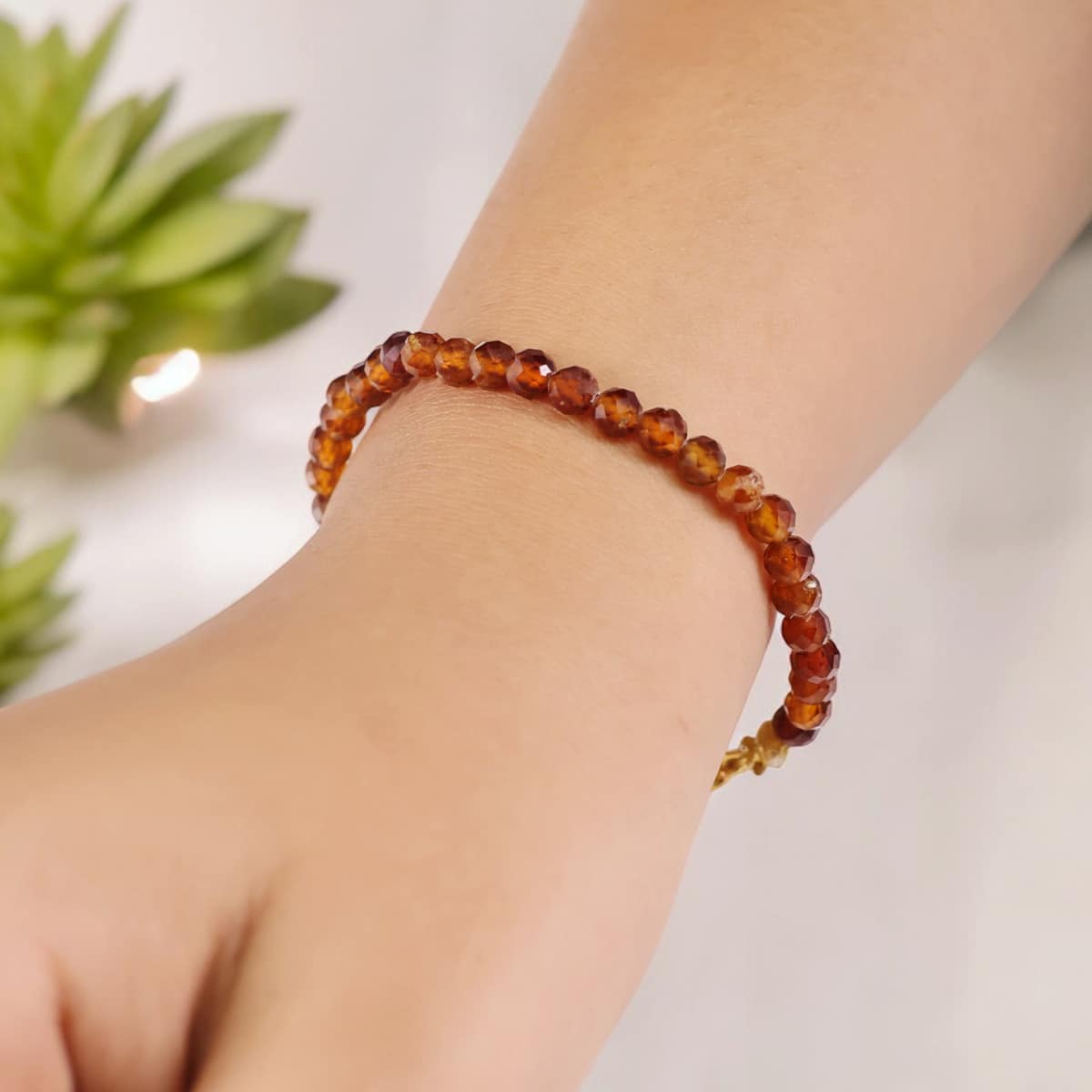 Hessonite Bracelet In 4mm Faceted Beads in India, US, UK, Australia, Europe