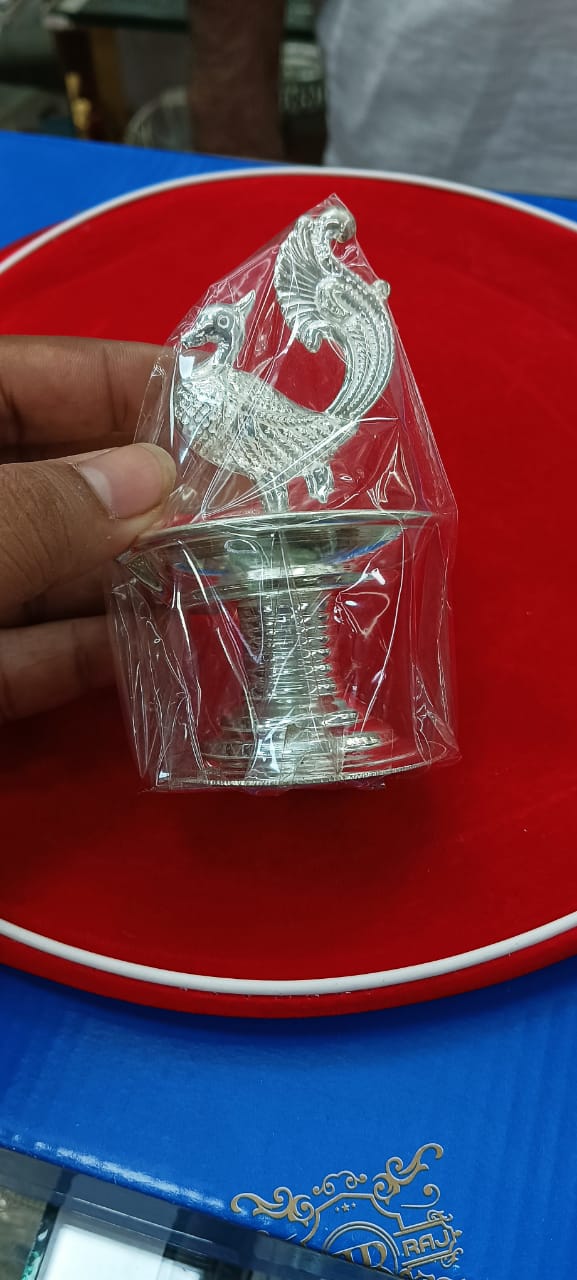 Silver Diya with Peacock Design Showpiece on Top of Diya for Home Temple, Silver Gift Items, Silver Diya for Pooja - 45 Gram in India, US, UK, Australia, Europe