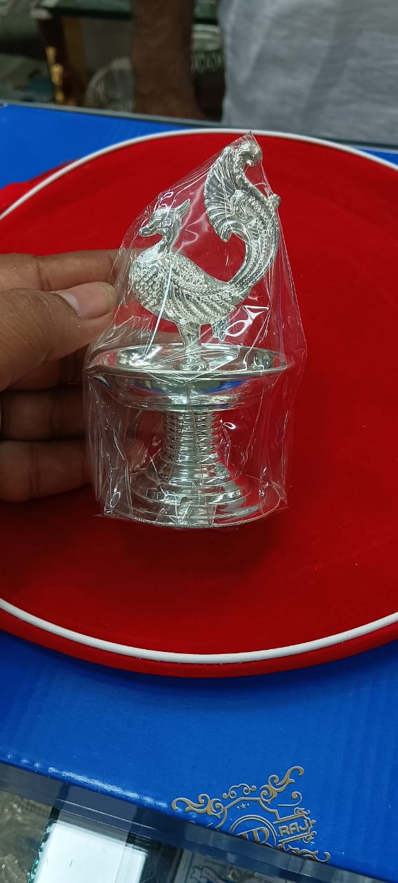 Silver Diya with Peacock Design Showpiece on Top of Diya for Home Temple, Silver Gift Items, Silver Diya for Pooja - 45 Gram in India, US, UK, Australia, Europe